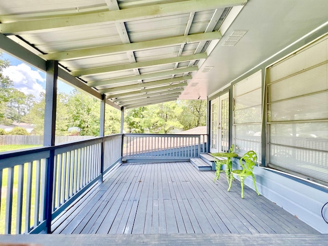 wooden deck featuring french doors