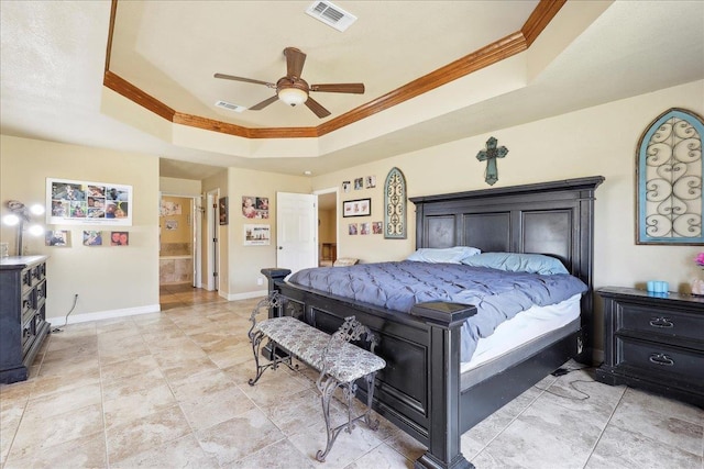 bedroom featuring crown molding, a raised ceiling, and ceiling fan