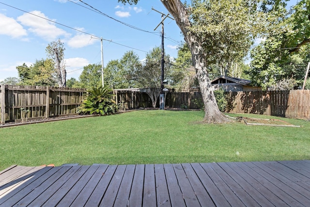 view of yard with a wooden deck