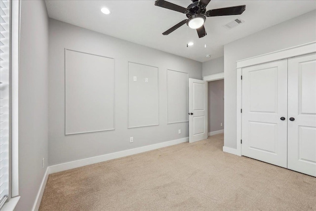 unfurnished bedroom with recessed lighting, baseboards, visible vents, and light carpet