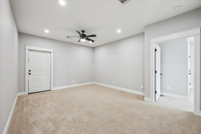 carpeted spare room featuring recessed lighting, baseboards, and ceiling fan