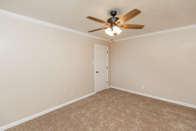 unfurnished room with ceiling fan, carpet floors, and crown molding