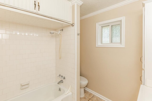 bathroom with tiled shower / bath combo, tile patterned floors, crown molding, a textured ceiling, and toilet