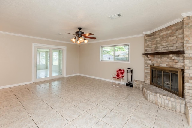 unfurnished living room featuring light tile patterned floors, a brick fireplace, ceiling fan, and ornamental molding