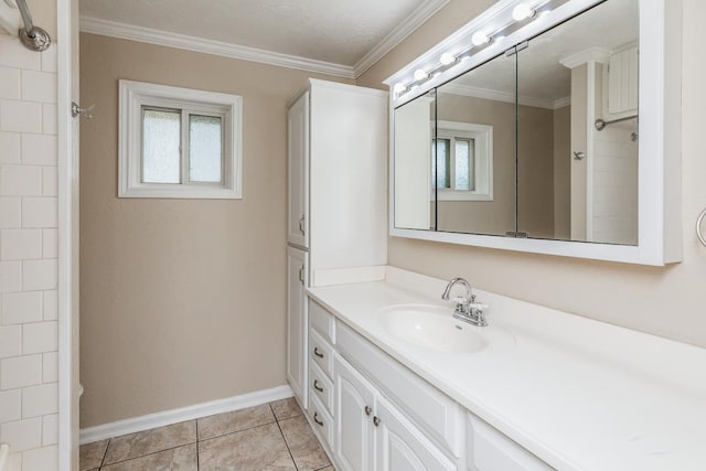 bathroom with tile patterned floors, plenty of natural light, and ornamental molding