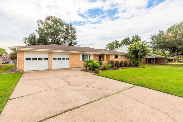 ranch-style home with a garage and a front yard