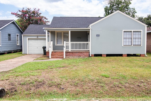 view of front facade featuring a porch, a garage, and a front lawn