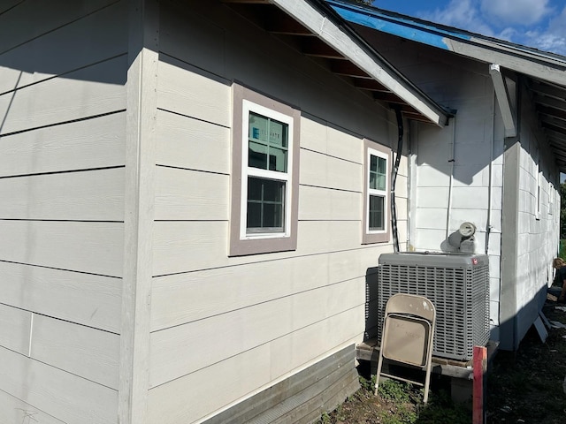 view of home's exterior featuring central air condition unit