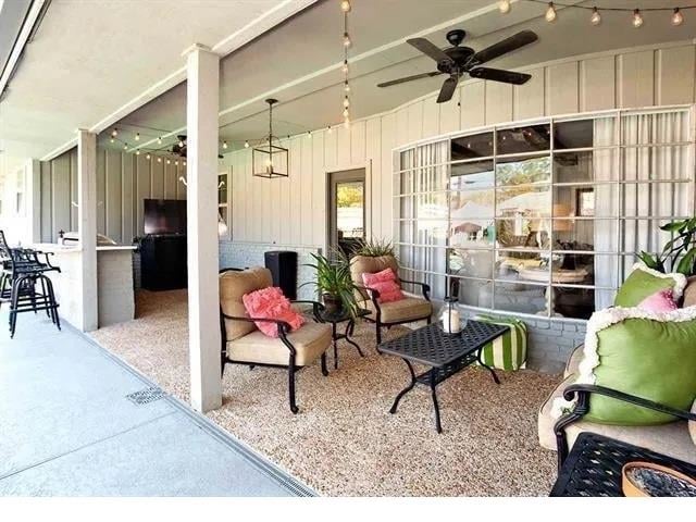 view of patio / terrace with ceiling fan and an outdoor hangout area