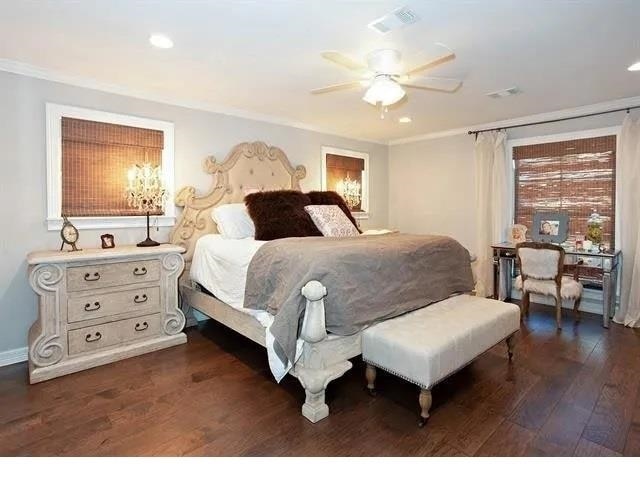 bedroom featuring ceiling fan and dark hardwood / wood-style flooring