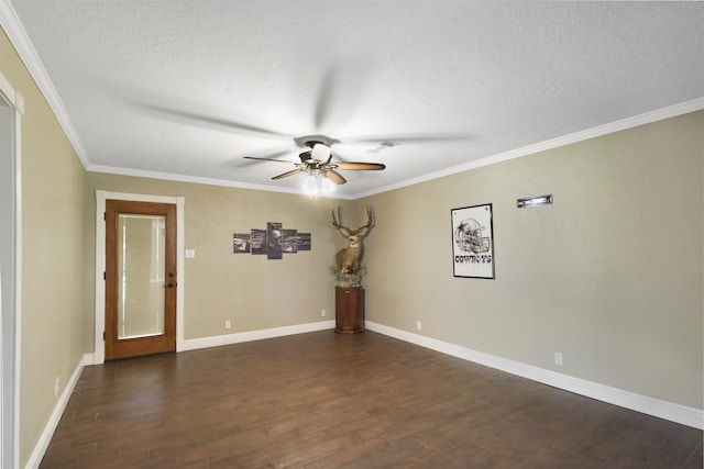 empty room with dark wood-style floors, ceiling fan, ornamental molding, and baseboards