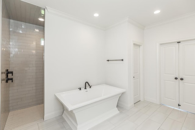 bathroom featuring ornamental molding and independent shower and bath