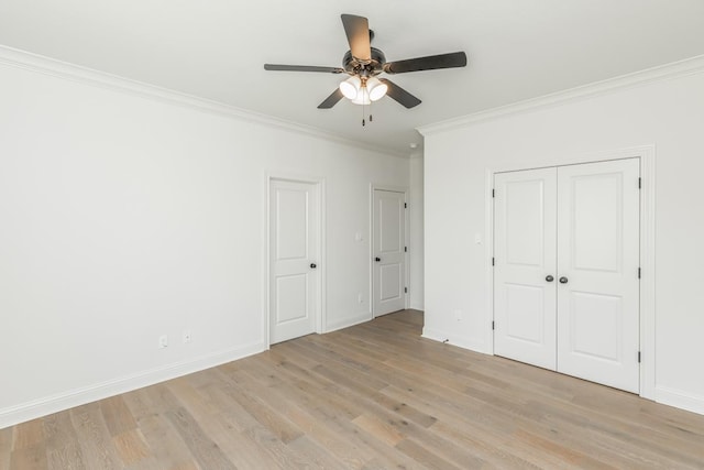 unfurnished bedroom with ornamental molding, ceiling fan, and light hardwood / wood-style floors