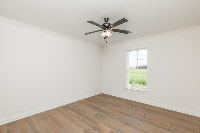 unfurnished room featuring hardwood / wood-style flooring, ceiling fan, and ornamental molding