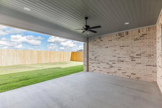 view of patio featuring ceiling fan