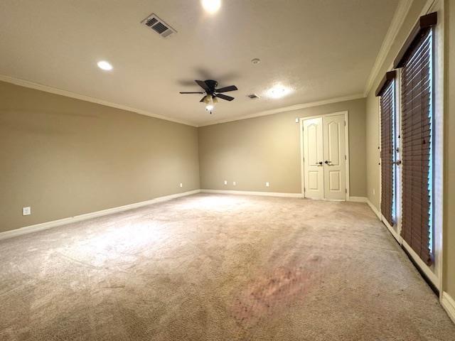 6845 Hialeah Dr, Beaumont, TX 77706 - empty room with light carpet, baseboards, ceiling fan, ornamental molding, and recessed lighting