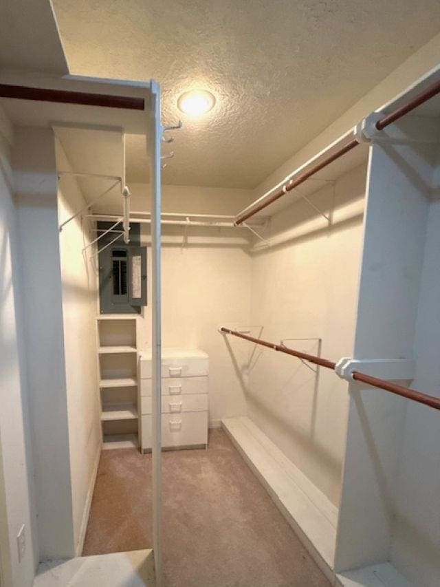 6845 Hialeah Dr, Beaumont, TX 77706 - spacious closet featuring carpet flooring
