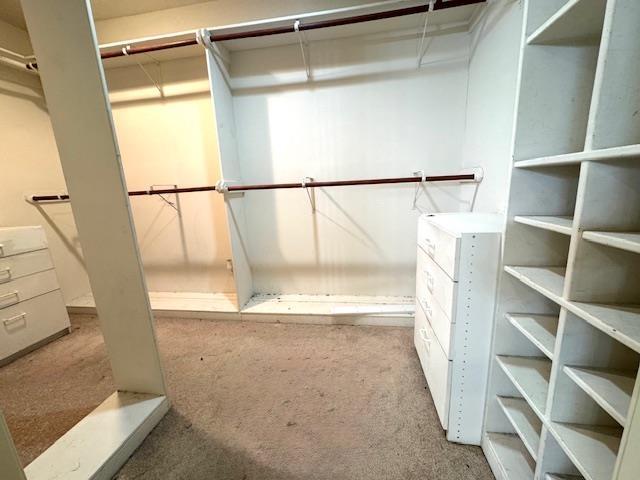 6845 Hialeah Dr, Beaumont, TX 77706 - spacious closet with carpet flooring