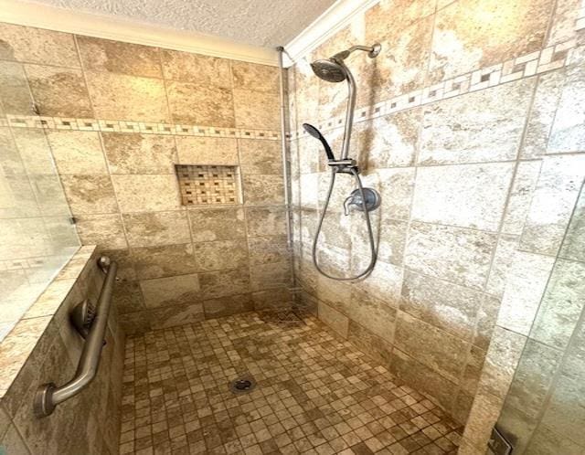 6845 Hialeah Dr, Beaumont, TX 77706 - full bath featuring a textured ceiling, ornamental molding, and a tile shower