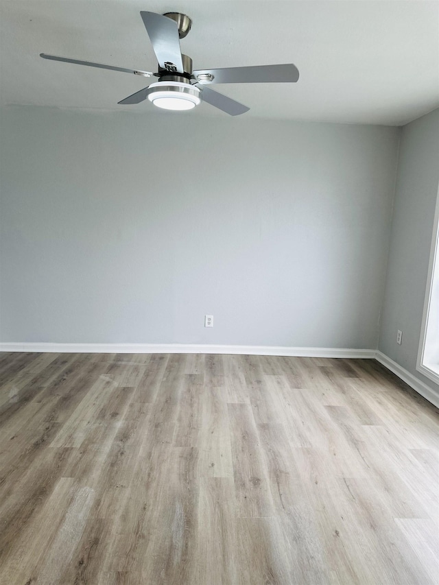 unfurnished room featuring ceiling fan and light hardwood / wood-style flooring