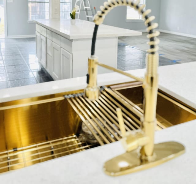 details featuring white cabinets