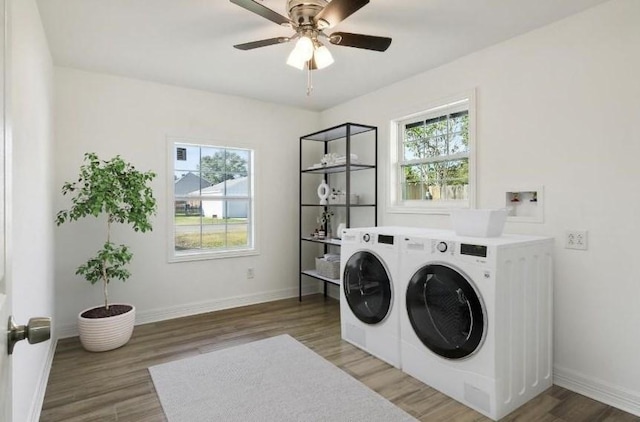 washroom featuring ceiling fan, dark wood-type flooring, and washing machine and clothes dryer