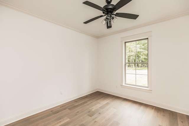 unfurnished room featuring ornamental molding, light hardwood / wood-style floors, and ceiling fan