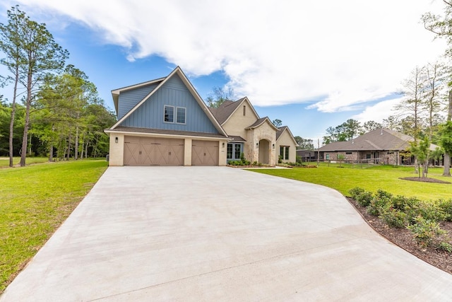 view of front of home featuring a garage and a front lawn