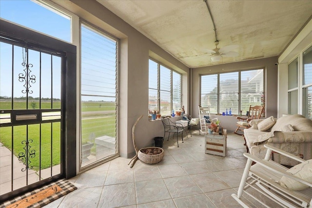 sunroom / solarium featuring tile patterned flooring
