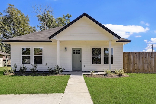 bungalow with a front lawn