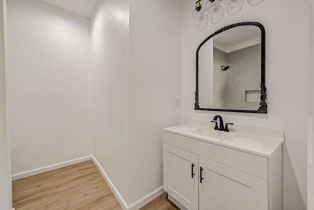 bathroom featuring vanity and hardwood / wood-style flooring