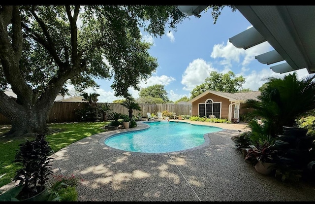 4859 Cleveland Ave, Groves, TX 77619 - view of pool with a fenced backyard and a patio area