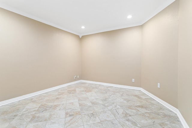 spare room with ornamental molding, recessed lighting, and baseboards