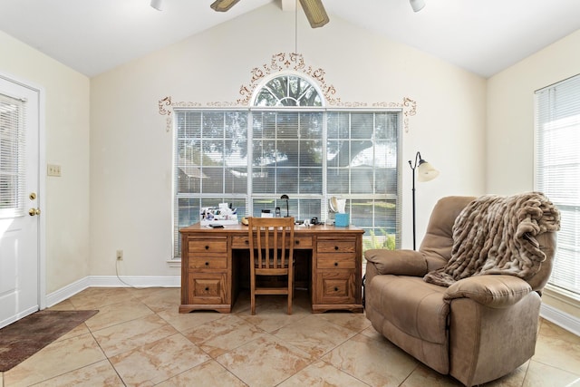 office space with lofted ceiling, baseboards, and a ceiling fan