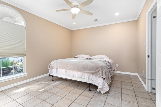 bedroom featuring visible vents, crown molding, baseboards, and light tile patterned flooring