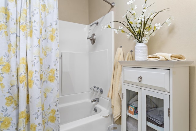 bathroom featuring shower / bath combination with curtain