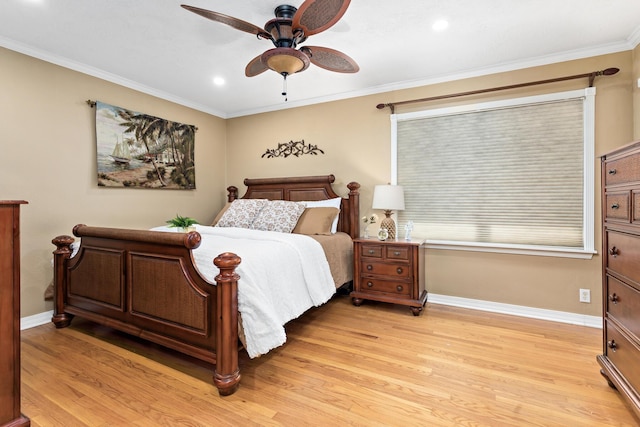 bedroom with light wood-style floors, ornamental molding, baseboards, and ceiling fan