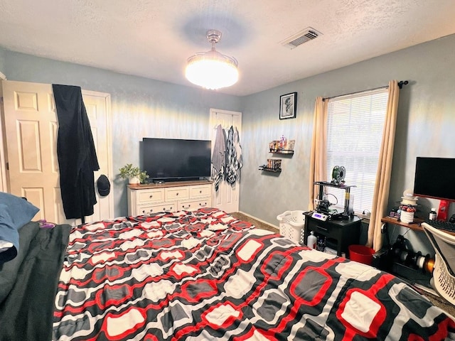 bedroom with a textured ceiling