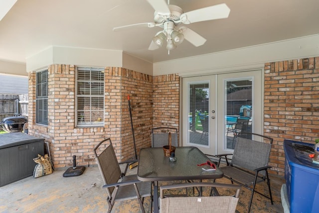 view of patio with french doors and ceiling fan