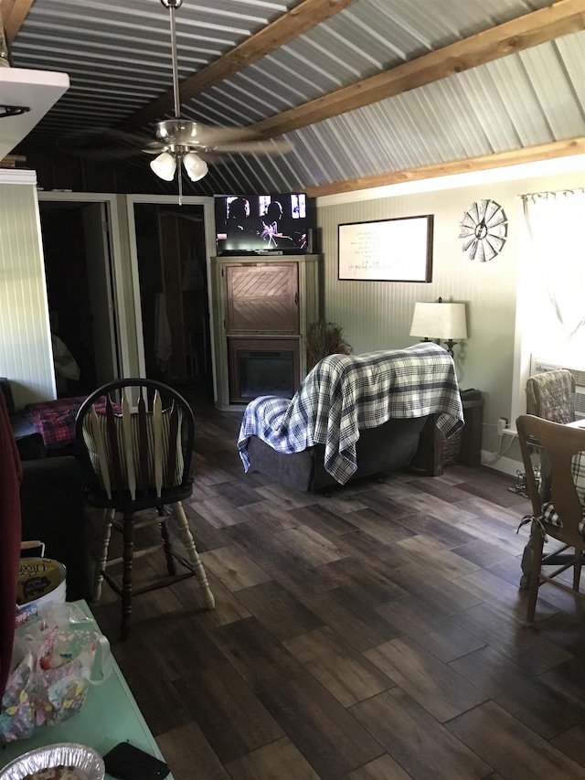 bedroom with vaulted ceiling, dark hardwood / wood-style floors, and ceiling fan