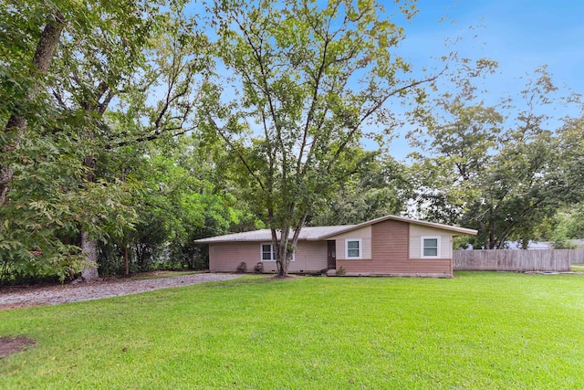 view of front of property with a front lawn