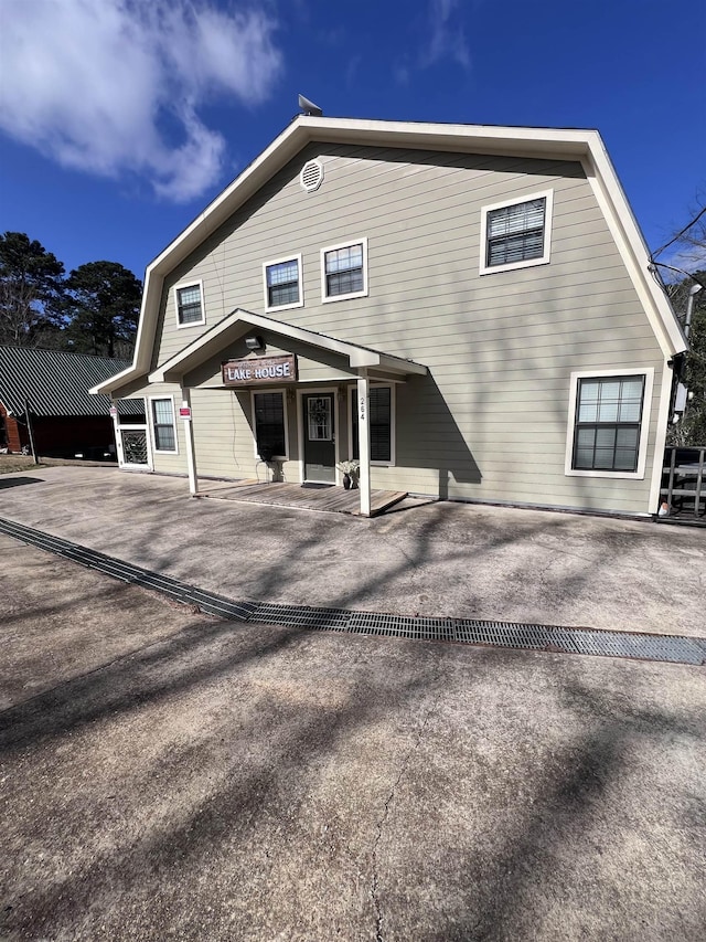 rear view of house with a patio