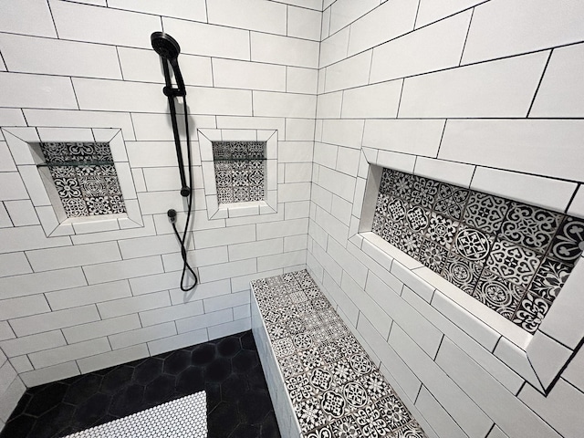 4885 Silver Leaf Dr, Orange, TX 77630 - full bathroom featuring a tile shower and tile walls