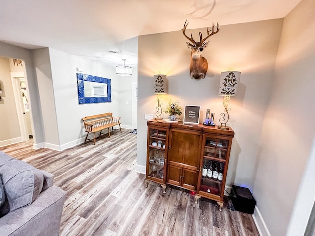 4885 Silver Leaf Dr, Orange, TX 77630 - bar area featuring wood finished floors and baseboards