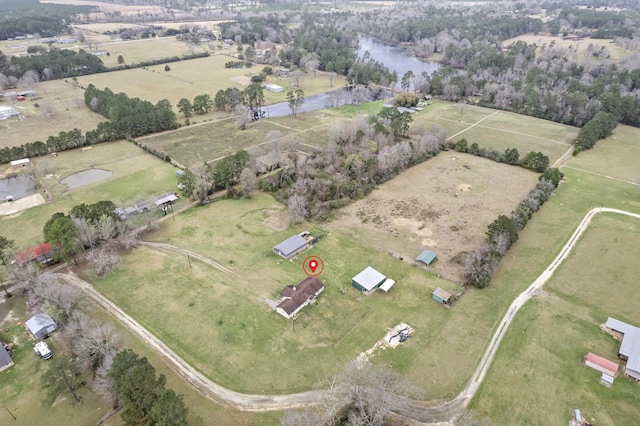 aerial view featuring a rural view and a water view