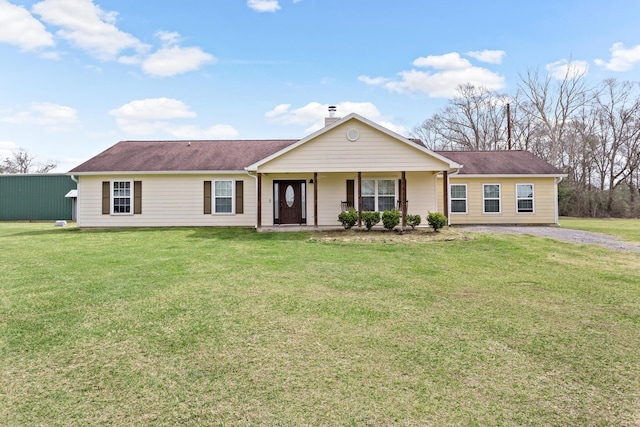 single story home with a chimney and a front yard