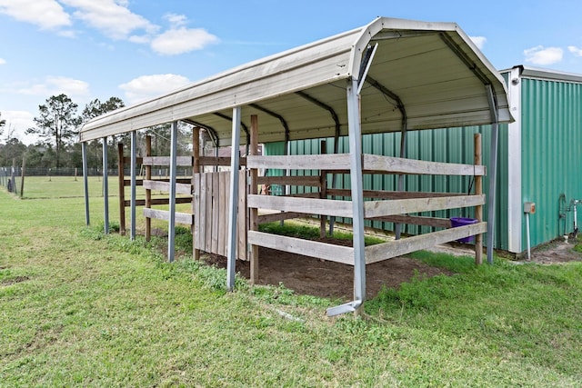 exterior space with a carport, an exterior structure, and an outdoor structure