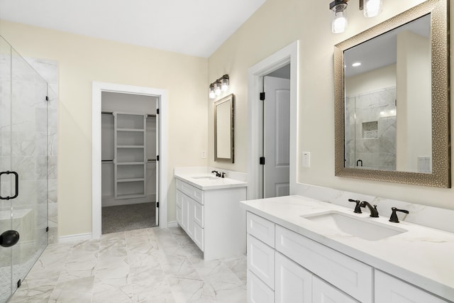 103 Ned, Lumberton, TX 77657 - bathroom with a shower stall, marble look tiles, two vanities, and a spacious closet