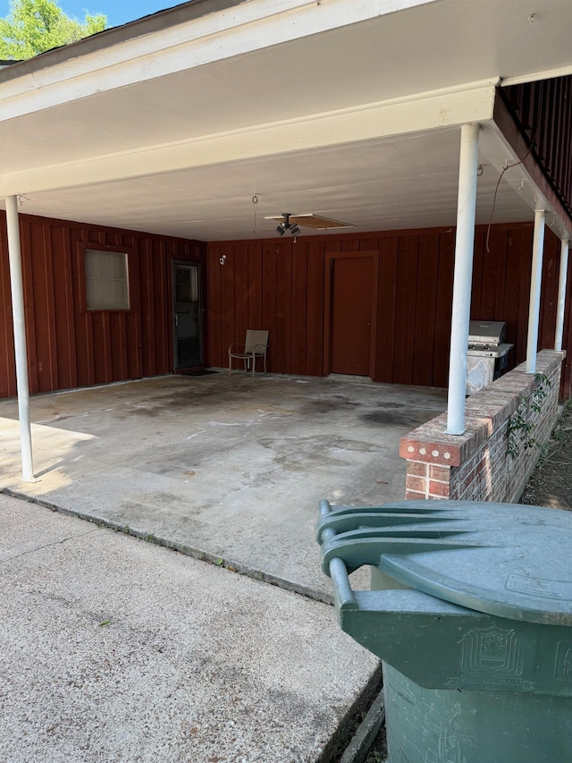 view of patio / terrace featuring an attached carport