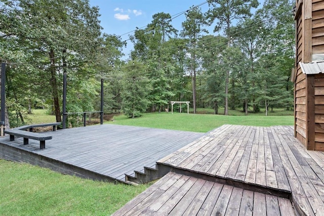 wooden terrace with a yard